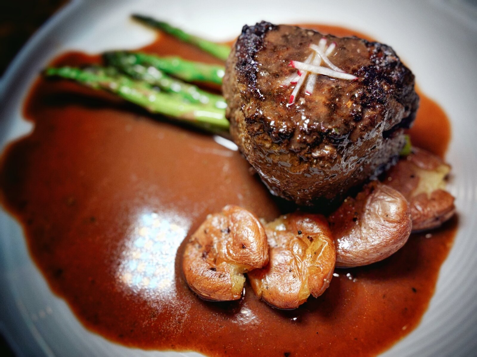 Chef-driven plated filet by Two Guys Catering