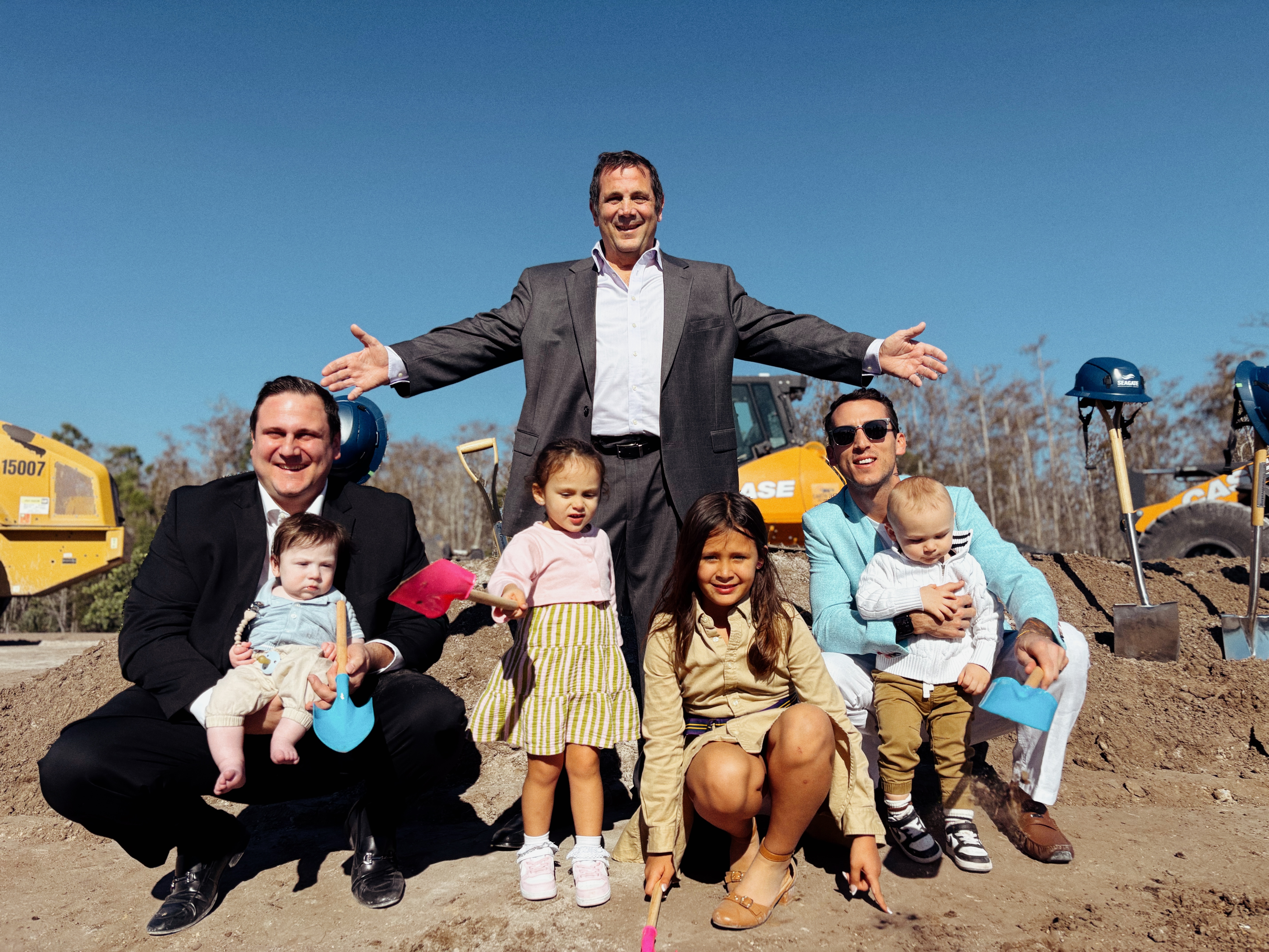 Falisi family gathered at the Palms Manor groundbreaking