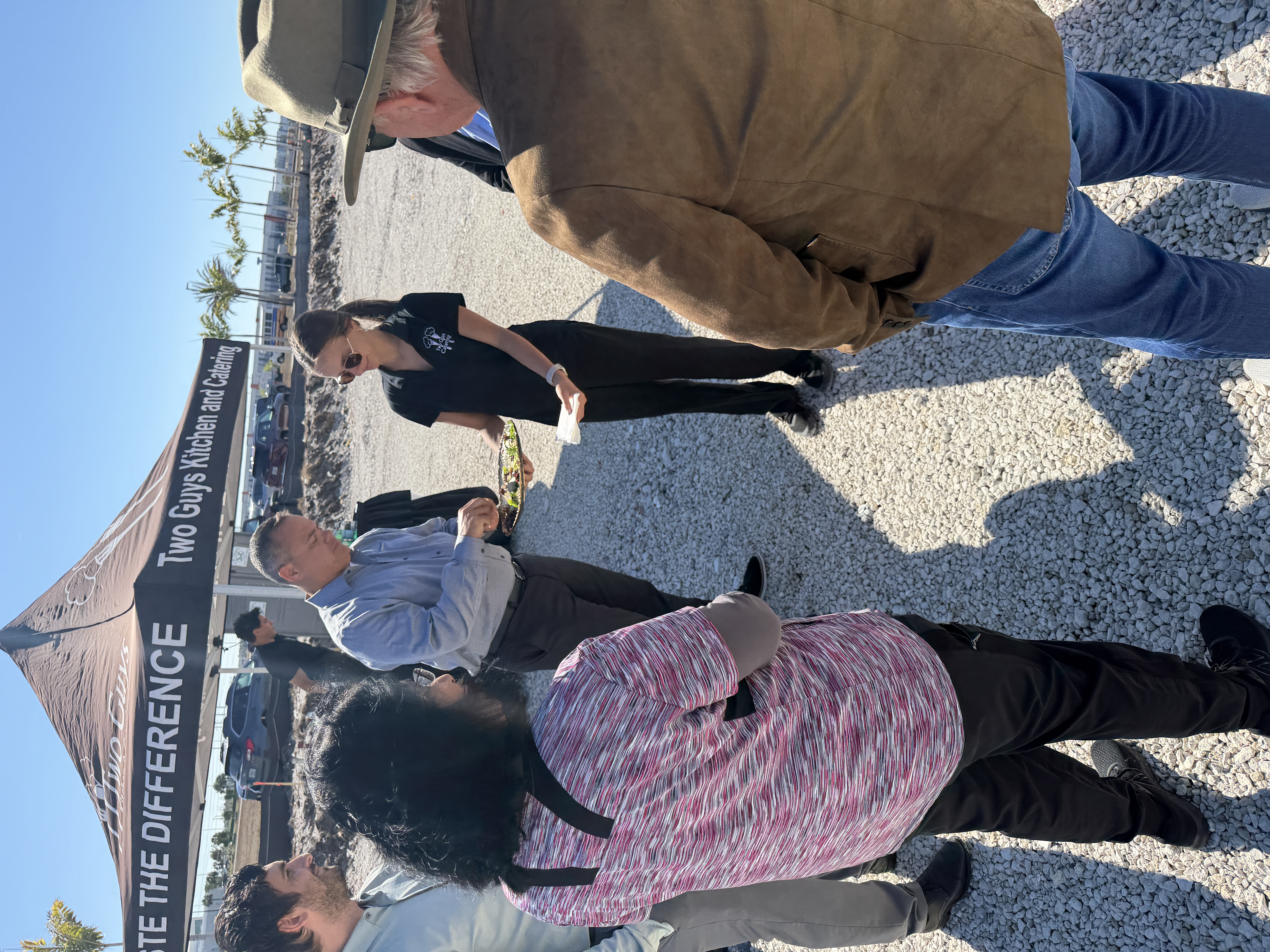 Guests chatting at the Palms Manor groundbreaking ceremony