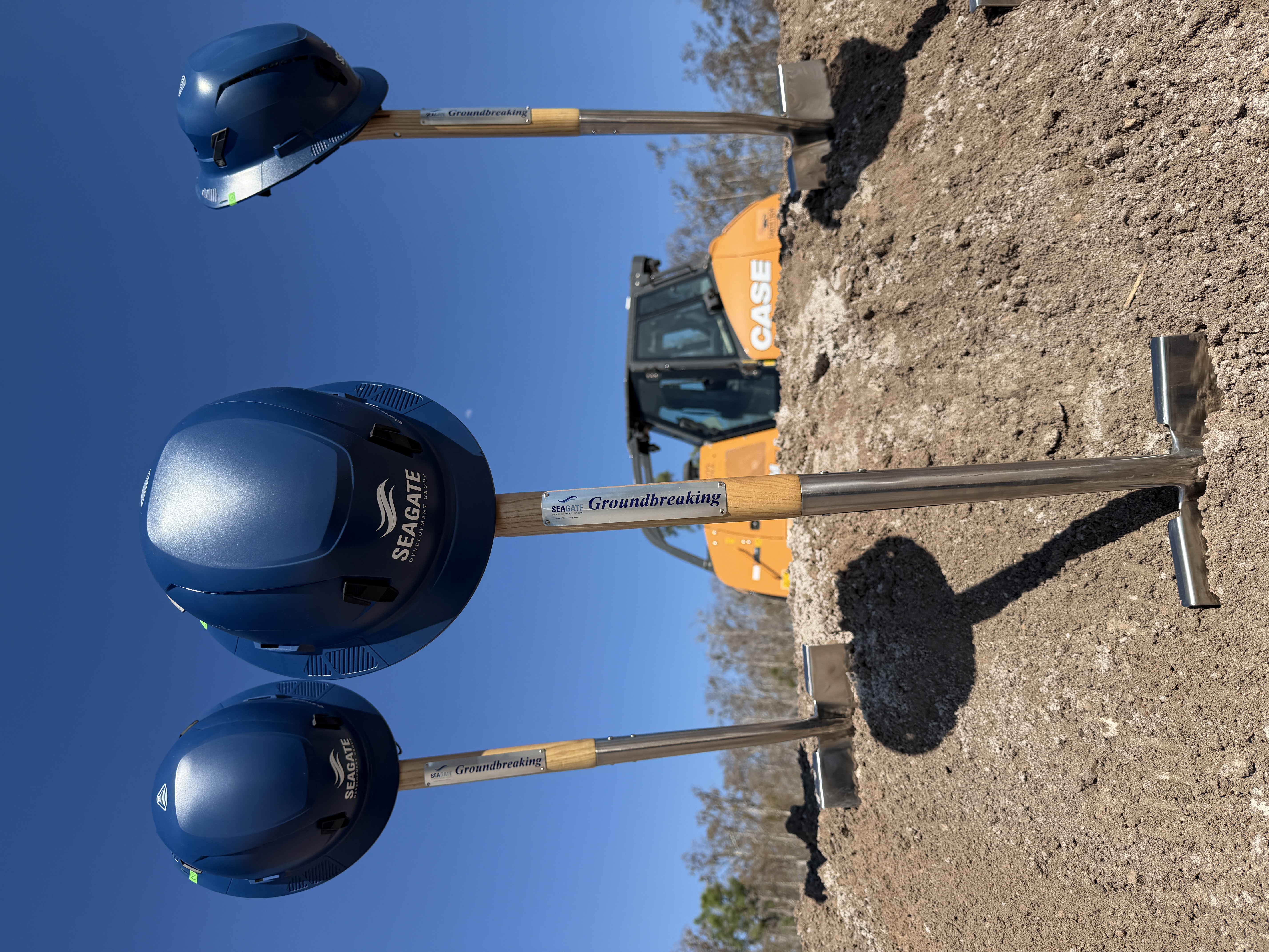 Palms Manor ceremonial hard hats displayed on shovels